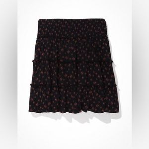 Black flowy mini skirt with rose floral detailing